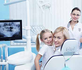 General Dentistry Waterloo ON Family Dentist A smiling family with healthy teeth